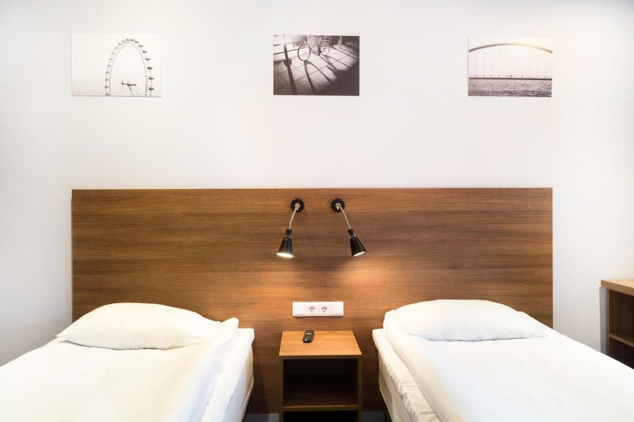 Отель Corner Hotel Вильнюс