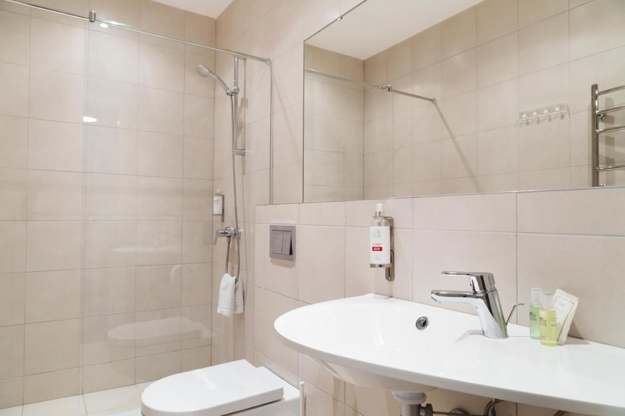 Отель Corner Hotel Вильнюс